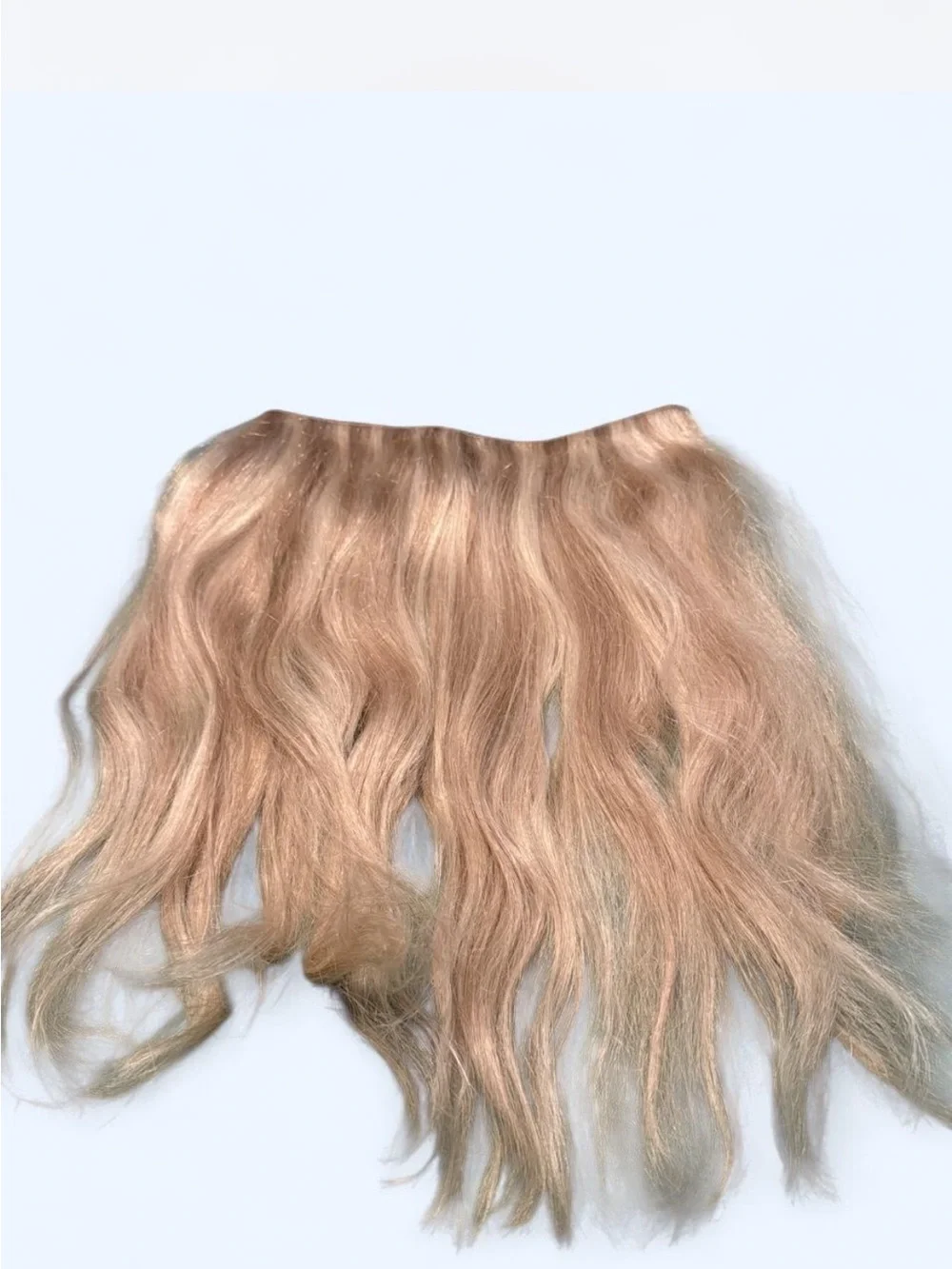 Blonde Wavy Clip-In Extensions with Subtle Ombré Effect